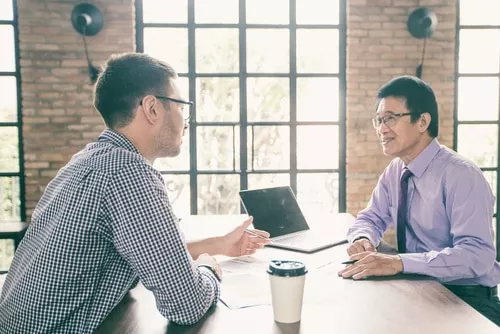 Salesperson speaking to customers
