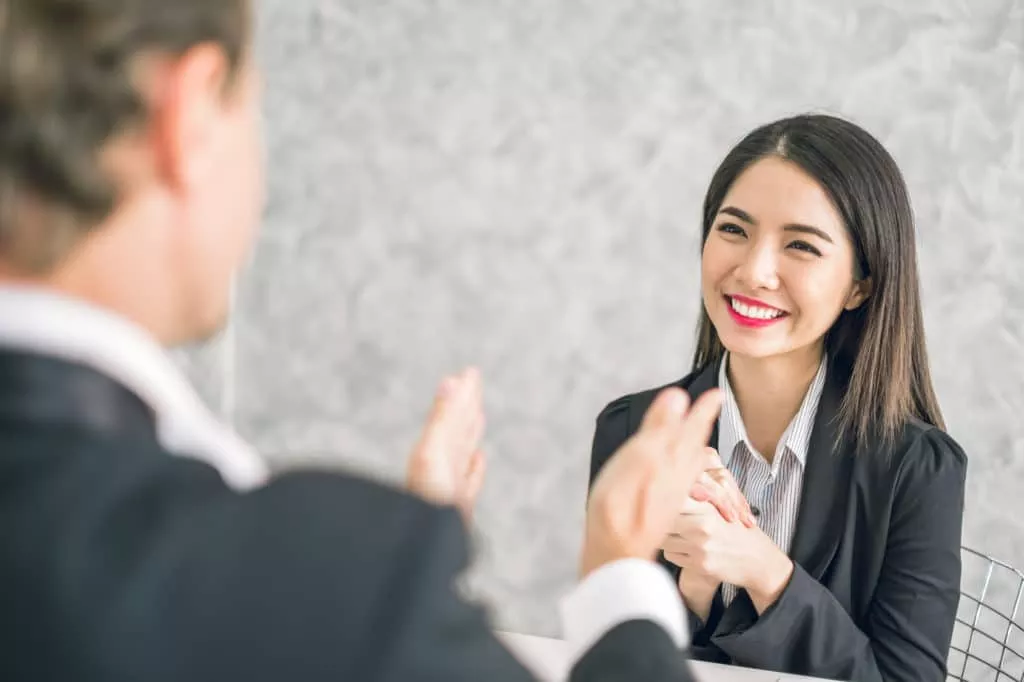 Boss clapping for employee's achievement 